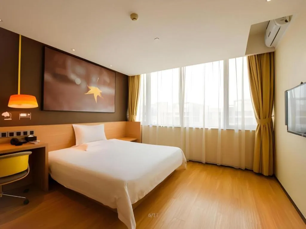 Bed in IU Hotel Kunming Jinma Bijifang Joy City