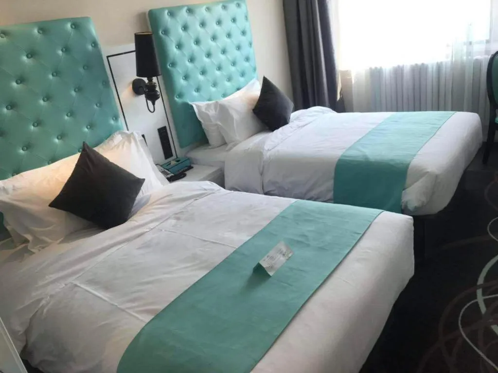 Bed in Xana Hotelle·JiNan Daminghu East Gate Shandong University