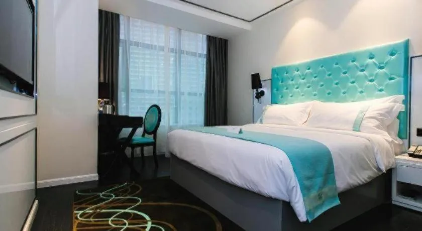 Bed in Xana Hotelle·JiNan Daminghu East Gate Shandong University