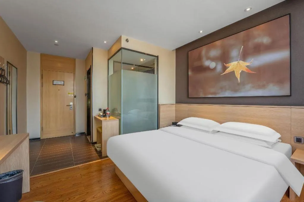 Bed in IU Hotels Xinzhou Bus Terminal