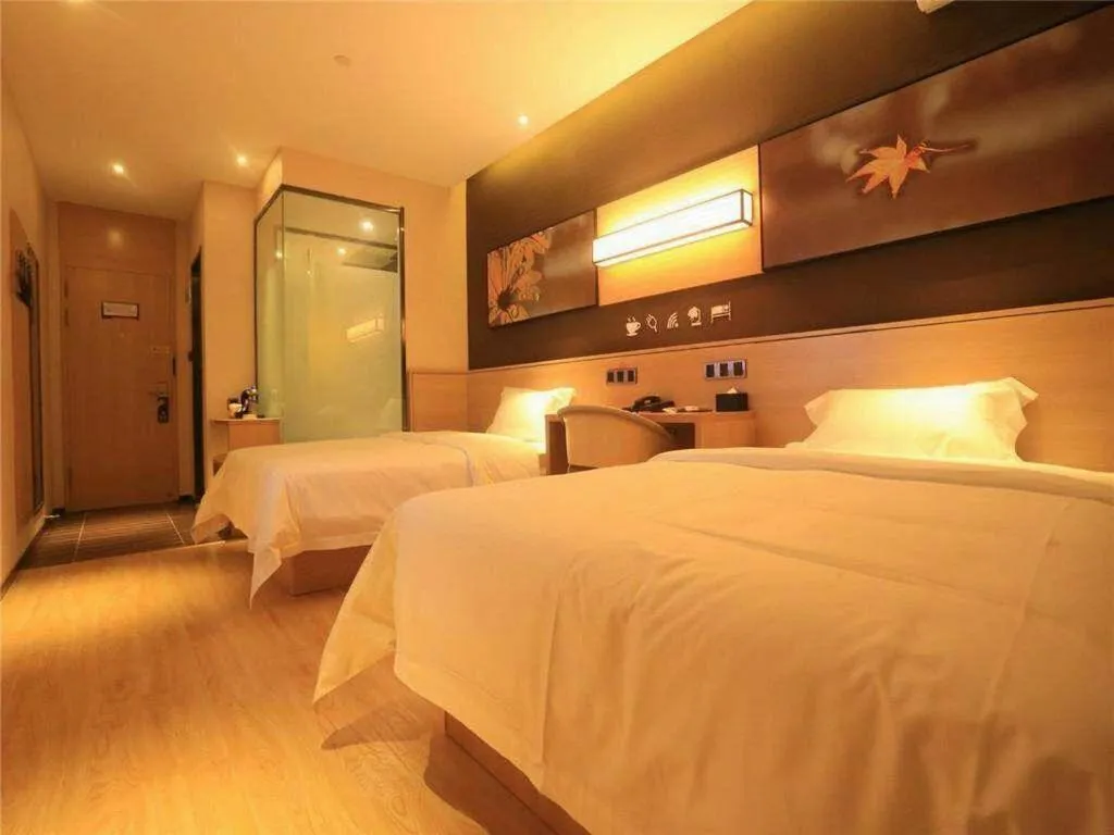 Bed in IU Hotels Xinzhou Bus Terminal