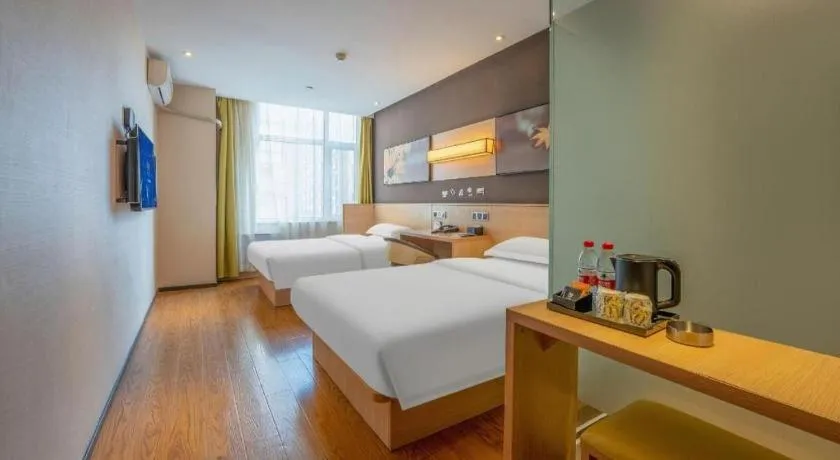 Bed in IU Hotels Xinzhou Bus Terminal