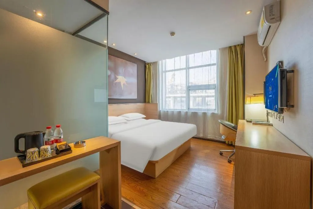 Bed in IU Hotels Xinzhou Bus Terminal