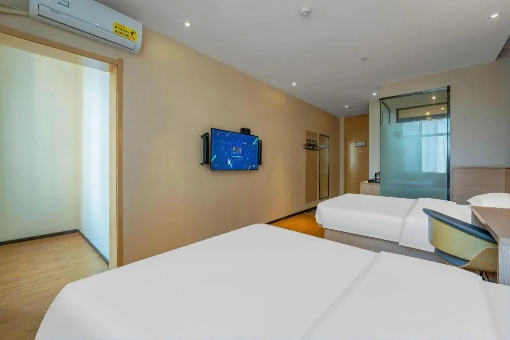 Bed in IU Hotels Xinzhou Bus Terminal