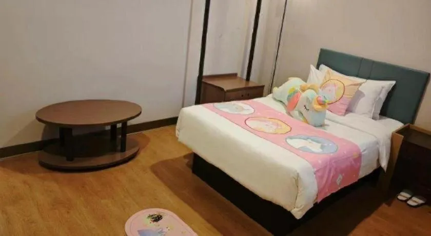 Bed in Magnotel Hotel Shanghai Railway Station Magnolia Plaza