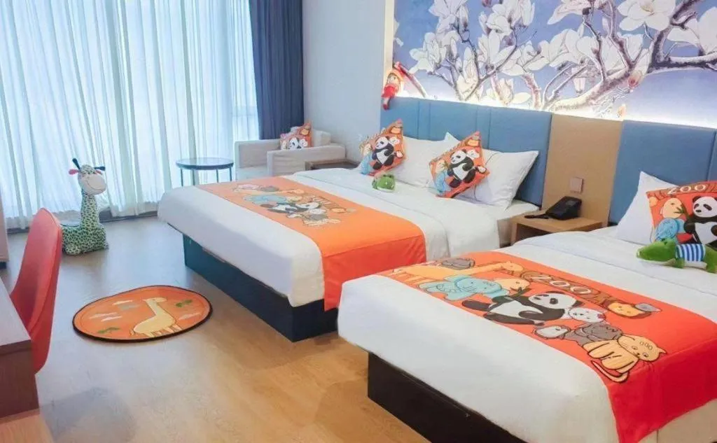 Bed in Magnotel Hotel Shanghai Railway Station Magnolia Plaza