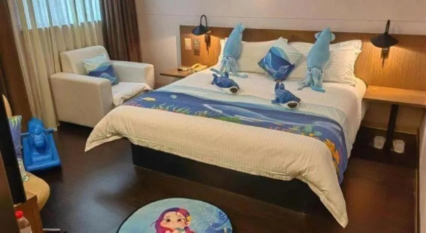 Bed in Magnotel Hotel Shanghai Railway Station Magnolia Plaza