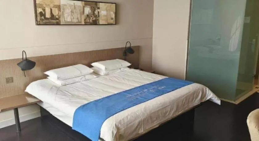 Bed in Jinjiang Inn Select Hohhot Chengjisihan Square Metro Station