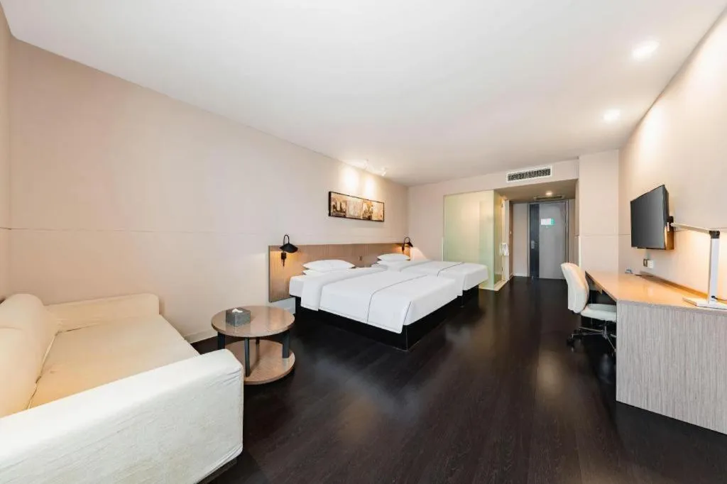 Bed in Jinjiang Inn Select Hohhot Chengjisihan Square Metro Station