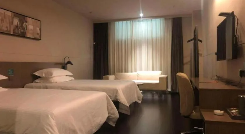 Bed in Jinjiang Inn Select Hohhot Chengjisihan Square Metro Station