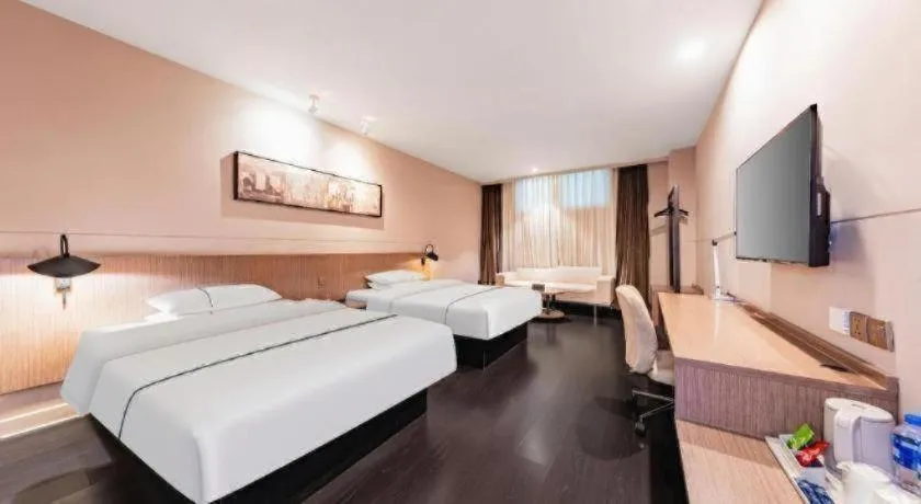 Bed in Jinjiang Inn Select Hohhot Chengjisihan Square Metro Station