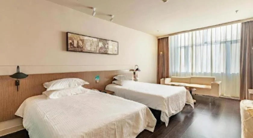 Bed in Jinjiang Inn Select Hohhot Chengjisihan Square Metro Station