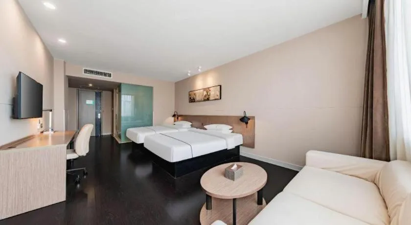 Bed in Jinjiang Inn Select Hohhot Chengjisihan Square Metro Station