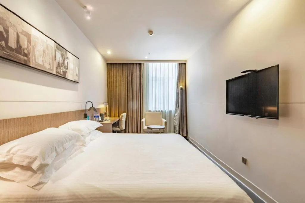 Bed in Jinjiang Inn Select Hohhot Chengjisihan Square Metro Station