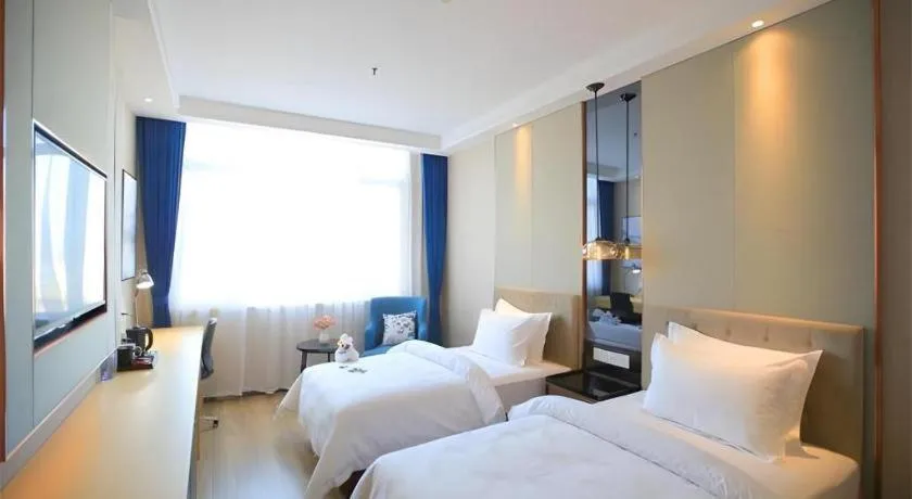 Bed in Jinjiang Metropolo Fuxin Yingbin Street Railway Station