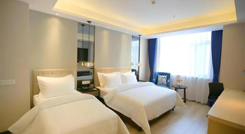 Bed in Jinjiang Metropolo Fuxin Yingbin Street Railway Station