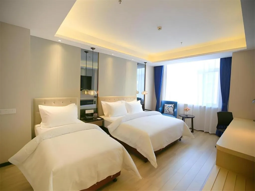 Bed in Jinjiang Metropolo Fuxin Yingbin Street Railway Station