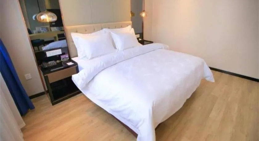 Bed in Jinjiang Metropolo Fuxin Yingbin Street Railway Station