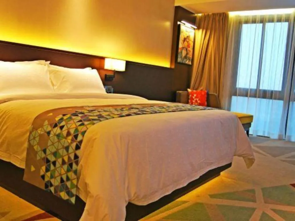 Bed in ZMAX Hotel Guangzhou Luogang Science City Shenzhou Road Metro Station