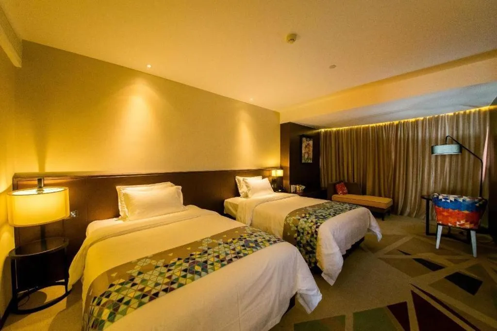Bed in ZMAX Hotel Guangzhou Luogang Science City Shenzhou Road Metro Station