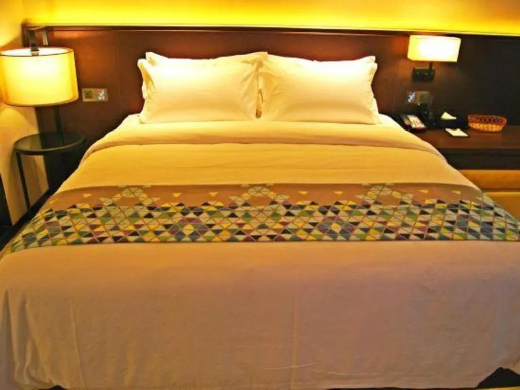 Bed in ZMAX Hotel Guangzhou Luogang Science City Shenzhou Road Metro Station