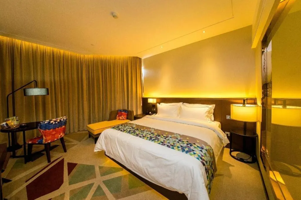 Bed in ZMAX Hotel Guangzhou Luogang Science City Shenzhou Road Metro Station