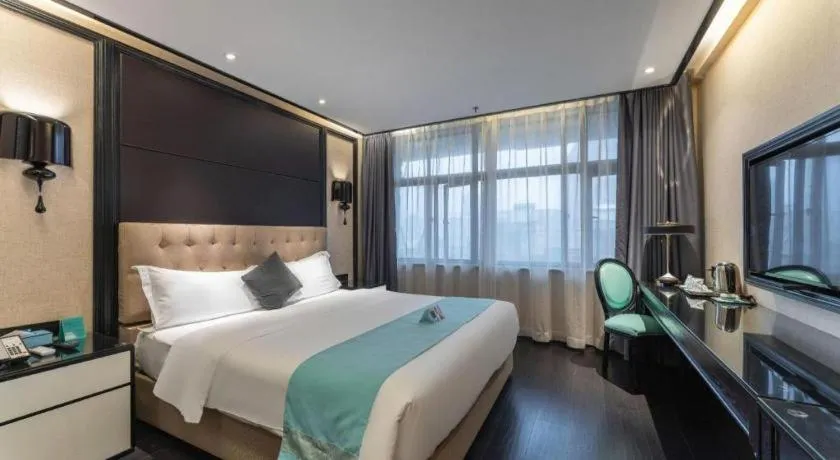 Bed in Xana Hotelle·Nanchang Bayi Square Metro Station