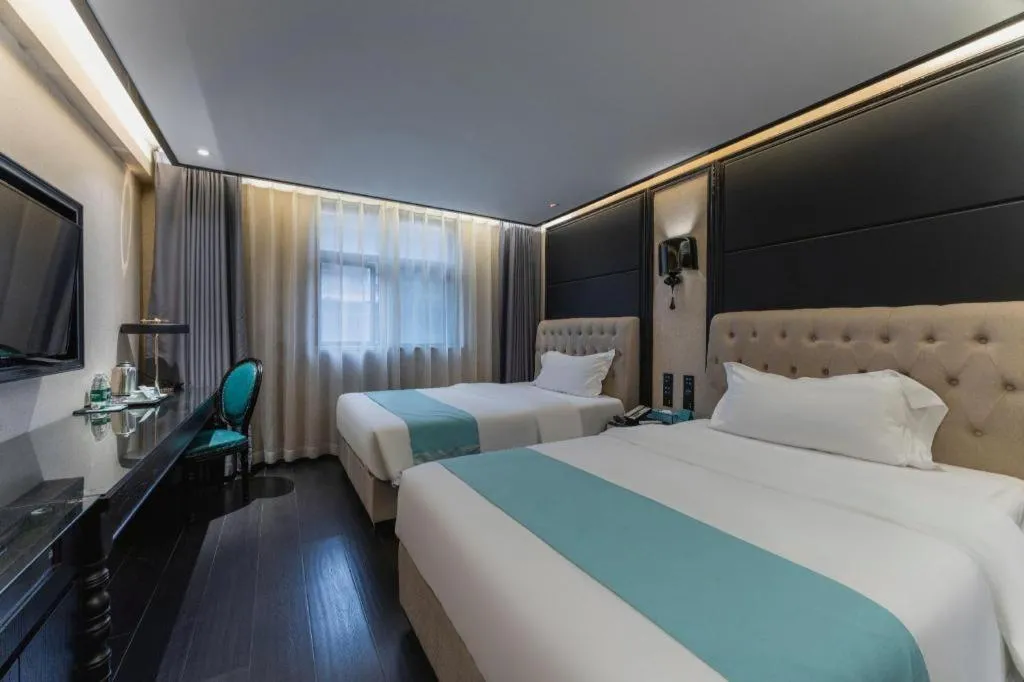 Bed in Xana Hotelle·Nanchang Bayi Square Metro Station