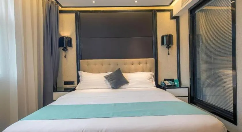 Bed in Xana Hotelle·Nanchang Bayi Square Metro Station