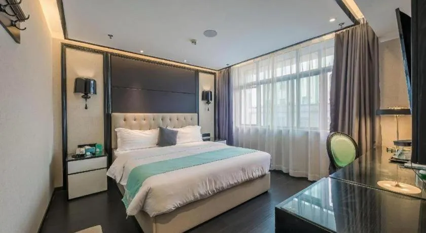 Bed in Xana Hotelle·Nanchang Bayi Square Metro Station