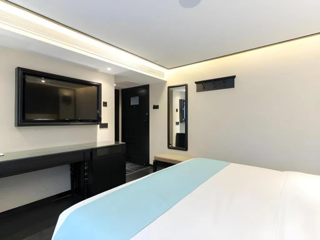 Bed in Xana Hotelle·Nanchang Bayi Square Metro Station