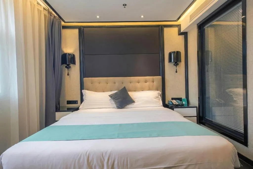 Bed in Xana Hotelle·Nanchang Bayi Square Metro Station