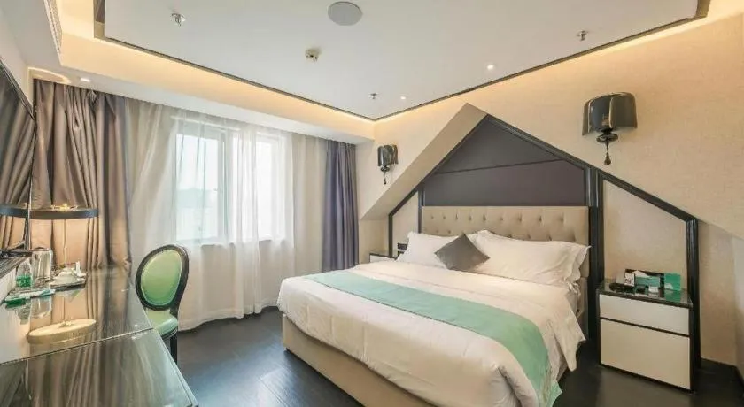 Bed in Xana Hotelle·Nanchang Bayi Square Metro Station