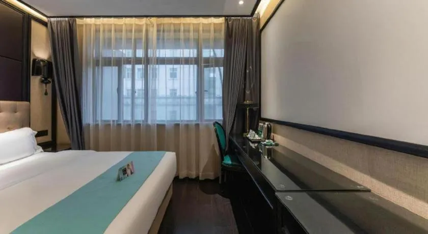 Bed in Xana Hotelle·Nanchang Bayi Square Metro Station