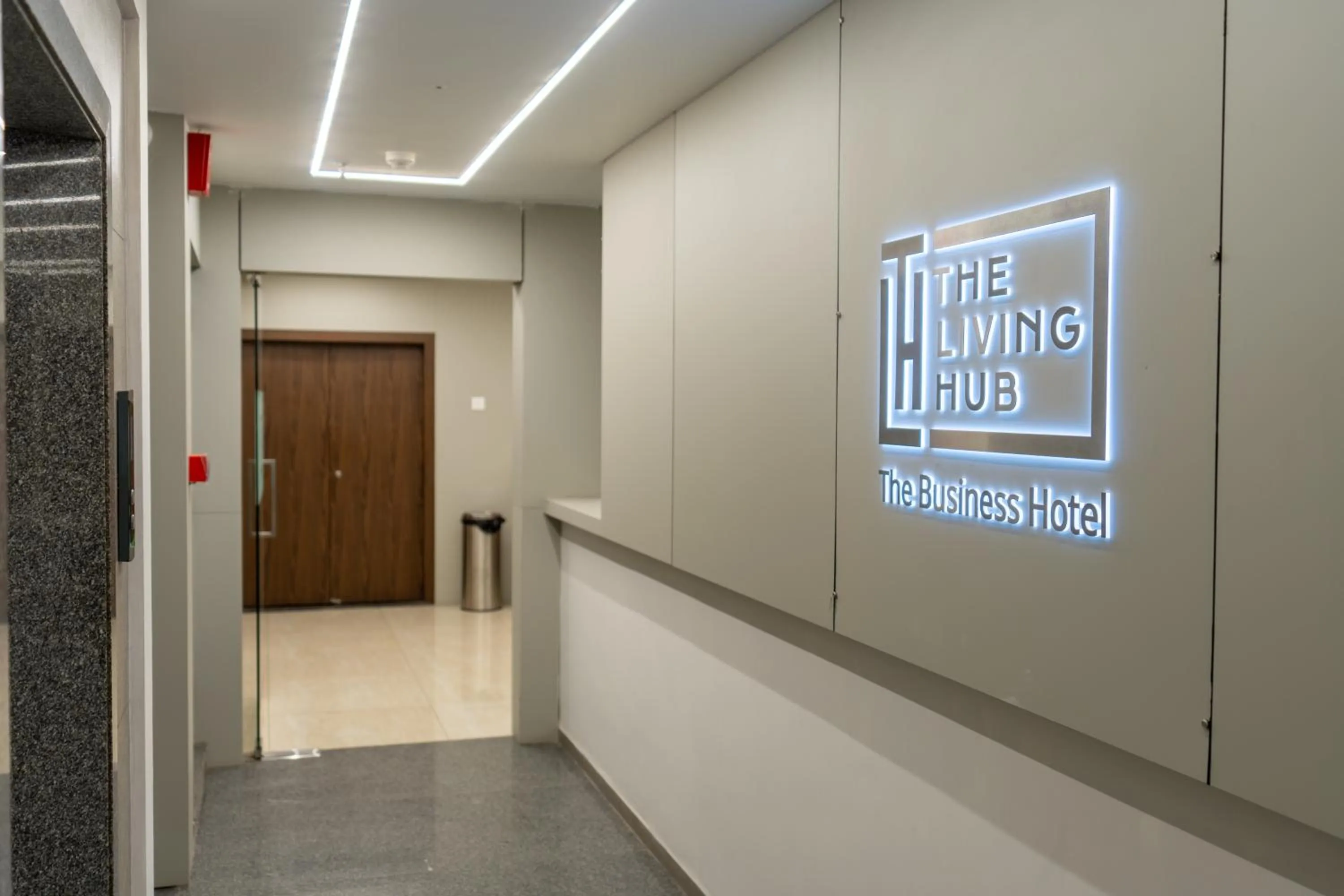 Property logo or sign in The Living Hub Business Hotel, Kolhapur