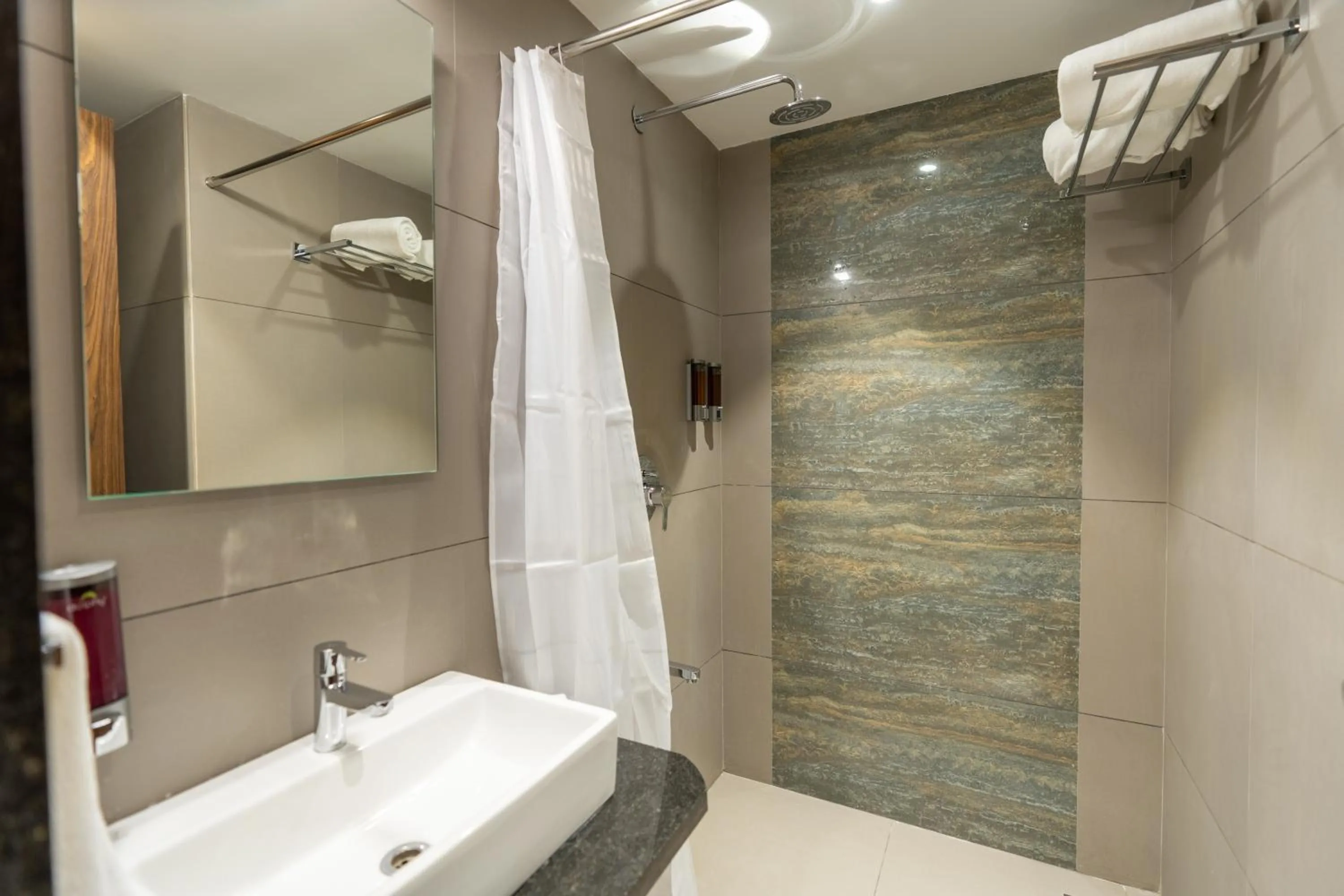 Bathroom in The Living Hub Business Hotel, Kolhapur