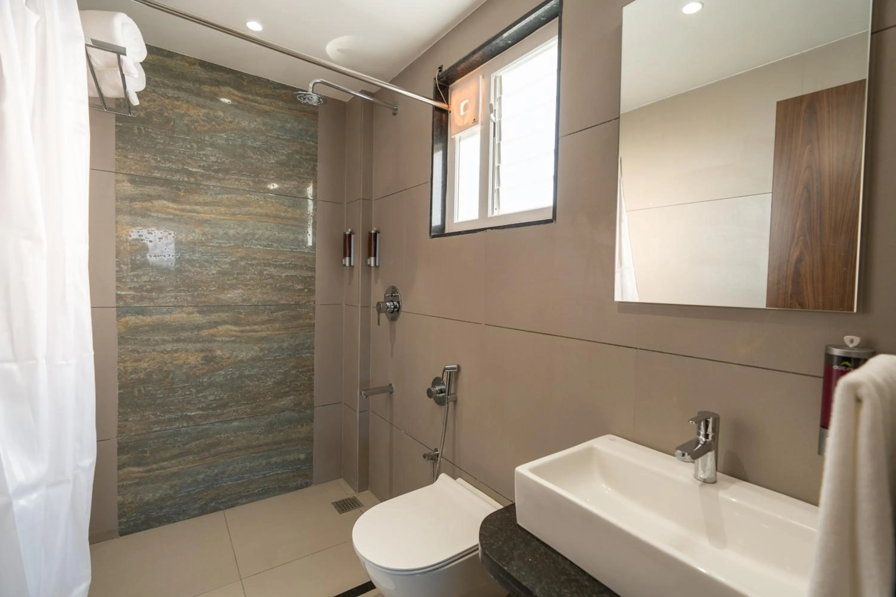 Bathroom in The Living Hub Business Hotel, Kolhapur