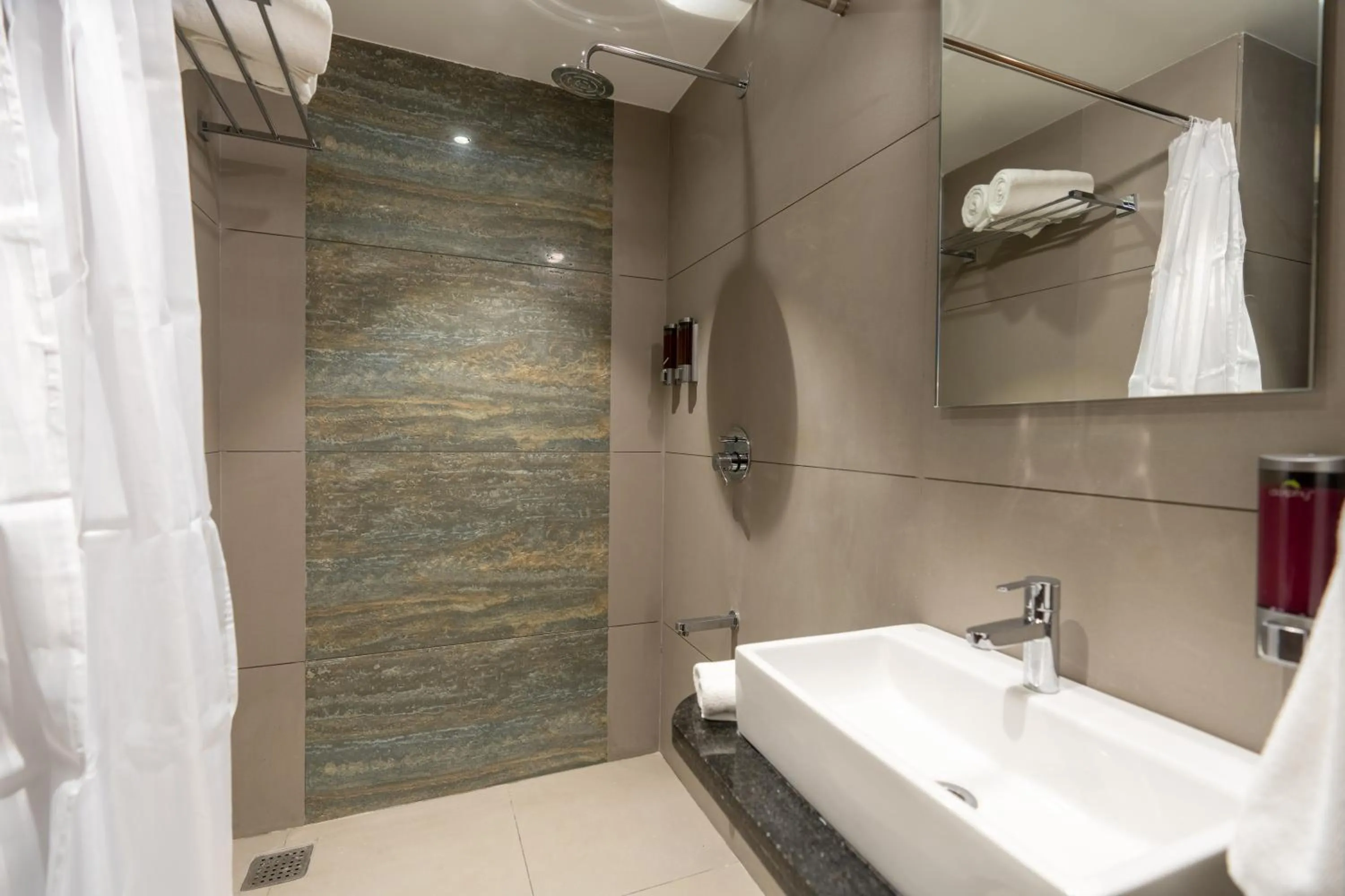 Bathroom in The Living Hub Business Hotel, Kolhapur