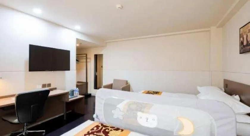 Bed in Jinjiang Inn Select Changchun Yuanda Street