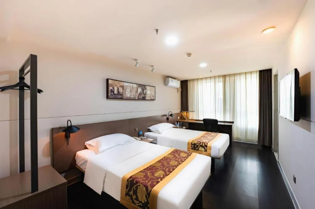 Bed in Jinjiang Inn Select Changchun Yuanda Street