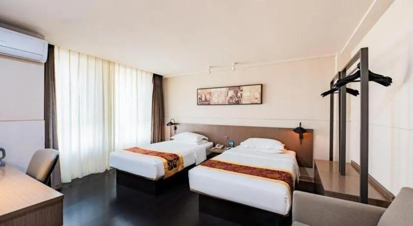 Bed in Jinjiang Inn Select Changchun Yuanda Street