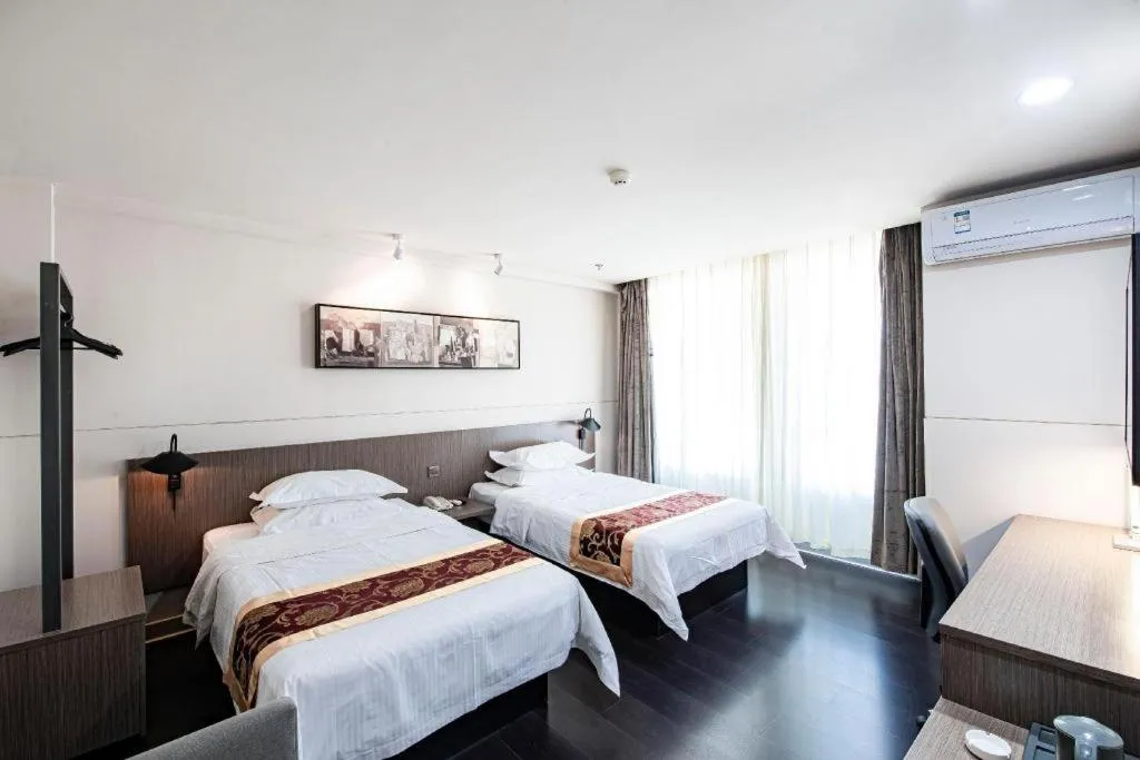 Bed in Jinjiang Inn Select Changchun Yuanda Street