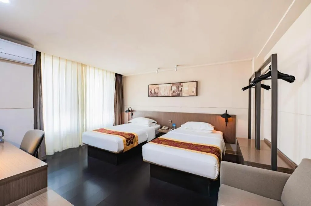 Bed in Jinjiang Inn Select Changchun Yuanda Street
