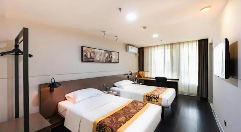 Bed in Jinjiang Inn Select Changchun Yuanda Street