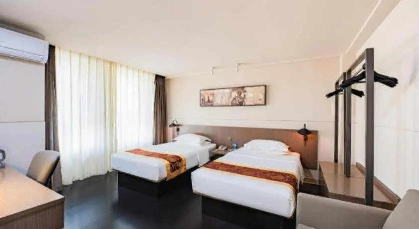 Bed in Jinjiang Inn Select Changchun Yuanda Street