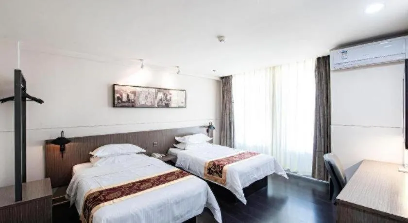 Bed in Jinjiang Inn Select Changchun Yuanda Street