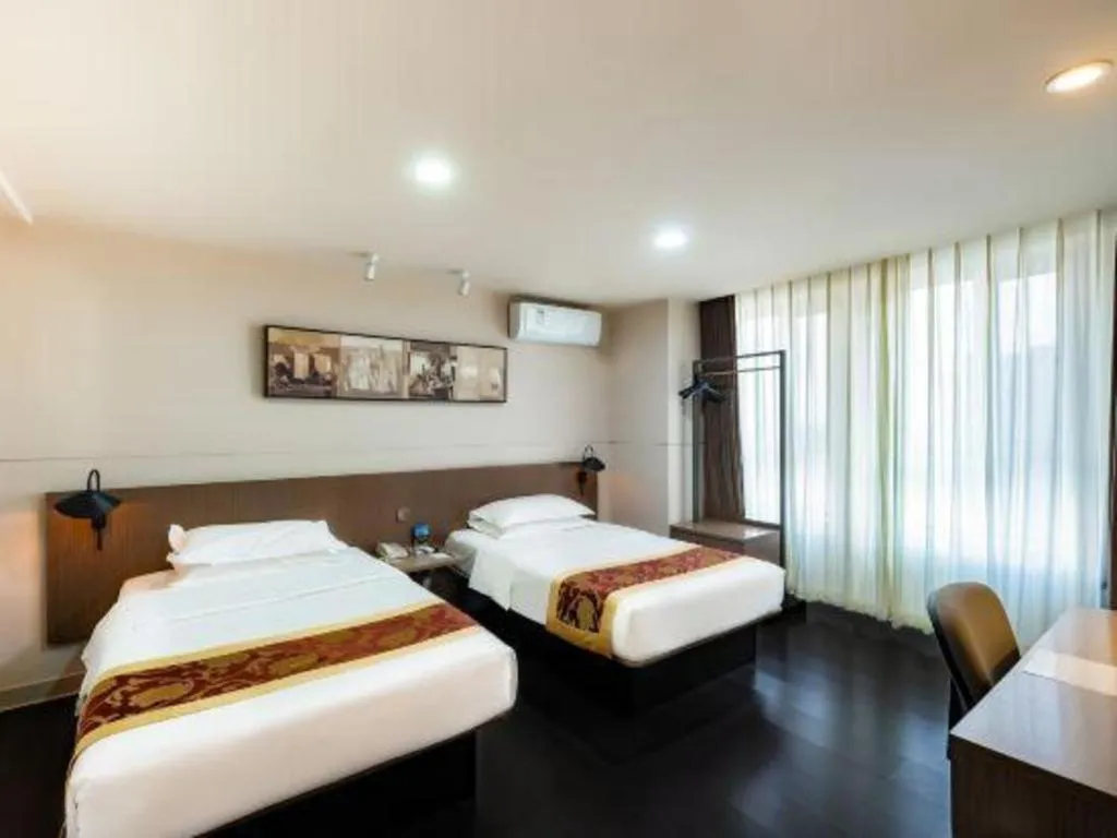 Bed in Jinjiang Inn Select Changchun Yuanda Street