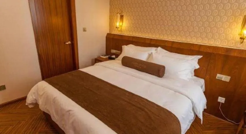 Bed in James Joyce Coffetel Chengdu Century City Convention and Exhibition Center