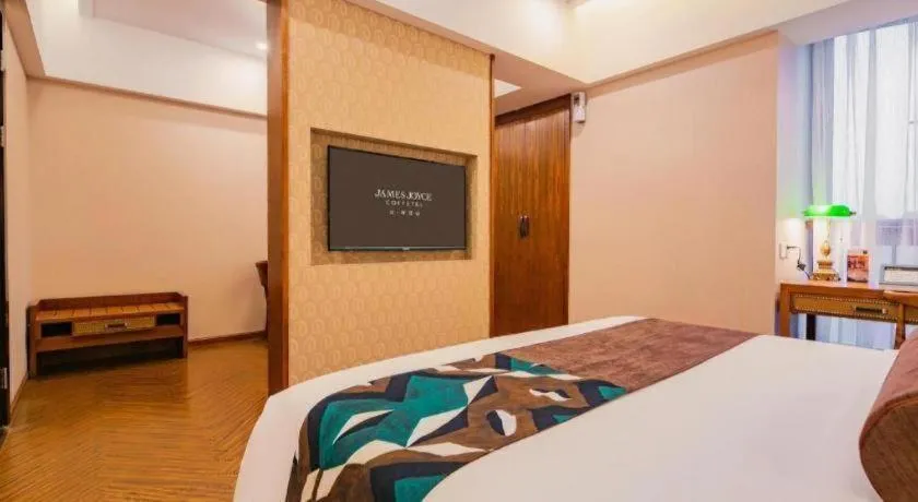 Bed in James Joyce Coffetel Chengdu Century City Convention and Exhibition Center