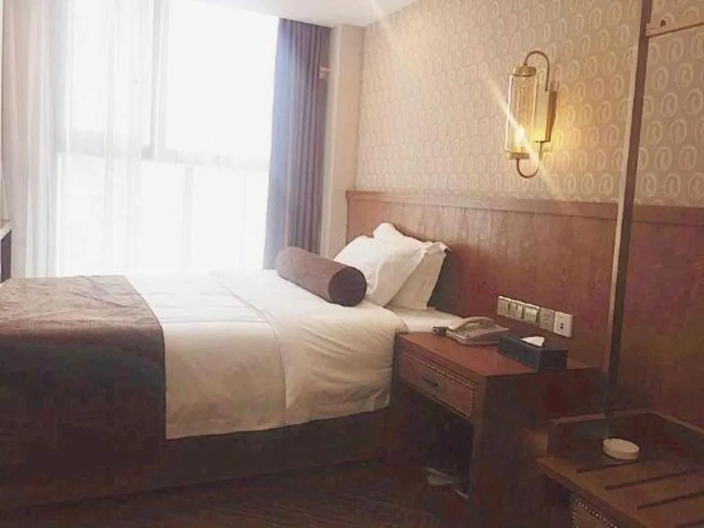 Bed in James Joyce Coffetel Chengdu Century City Convention and Exhibition Center